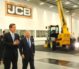SCALED - Prime Minister David Cameron and JCB Chairman Sir Anthony Bamford at the opening of JCB Brazil's new factory