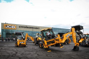 The JCB Dancing Diggers take a bow at the official opening of the world's biggest JCB dealer depot in Russia