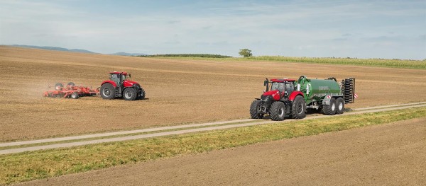 Case_IH_Optum_300_CVX_with_slurry_tank_on_the_road_and_Optum_300_CVX_with_disc_harrow_in_the_field