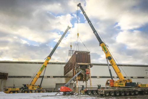 Dual Grove all-terrains provide stability in tight quarters for Detroit demolition